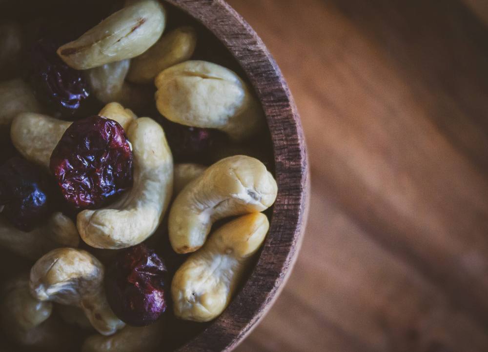 Cashews in a wooden bowl